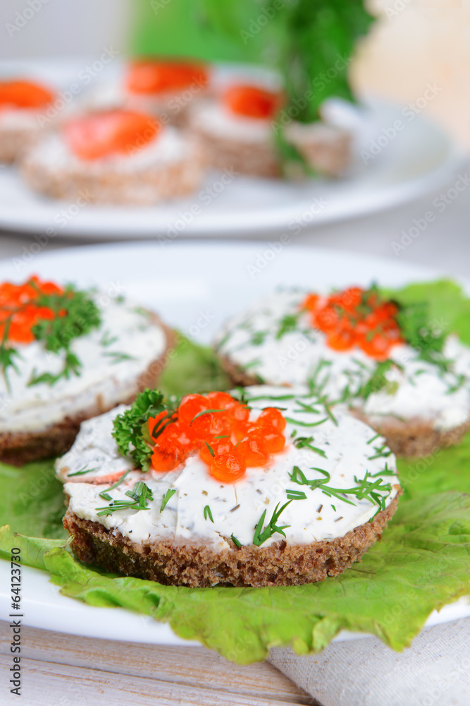 Delicious canapes on table close-up