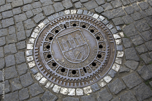 Manhole in the historical centre of Prague.