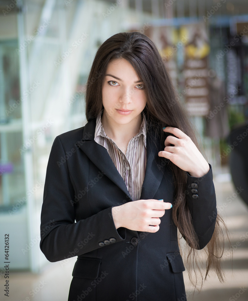 Portrait of a beautiful girl with green eyes.