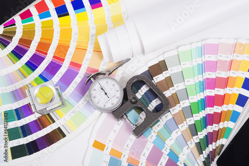 Lens , pantone and micrometer. Design and prepress concept