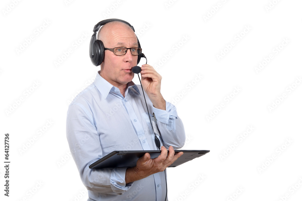 Man standing with a digital tablet Man standing with a digital tablet