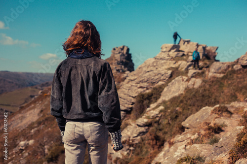 Young woman trekking in the mountains