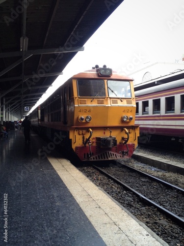 old yellow train in platform