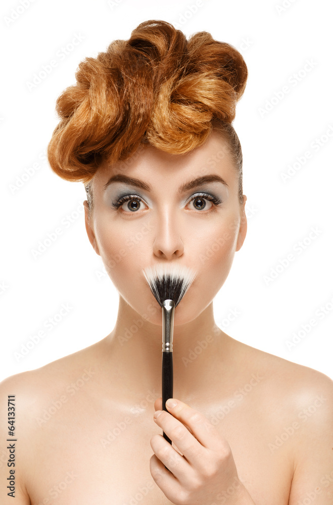 Beauty portrait of pretty woman with brush for makeup Beauty portrait of pretty woman with brush for makeup