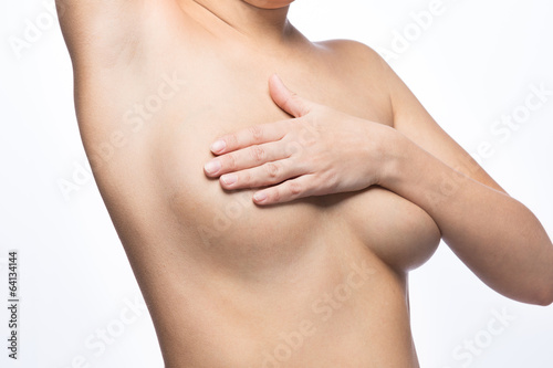 Beautiful woman with bare breasts