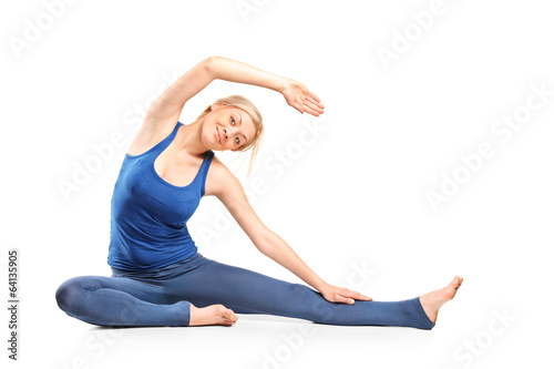 Fototapeta Naklejka Na Ścianę i Meble -  Blond girl practicing yoga