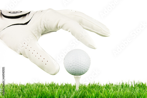 hand greift nach golfball