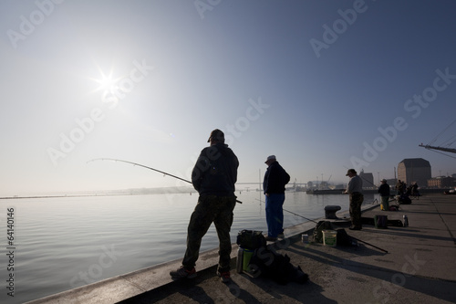 Billede på lærred Angler am frühen Morgen