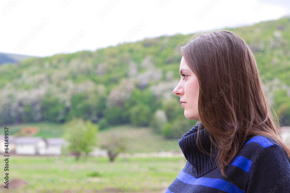 Pretty girl enjoying countryside view Pretty girl enjoying countryside view