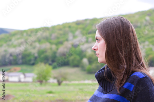 Pretty girl enjoying countryside view