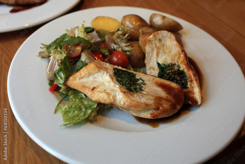 Slices of chicken stuffed with fresh herbs Slices of chicken stuffed with fresh herbs