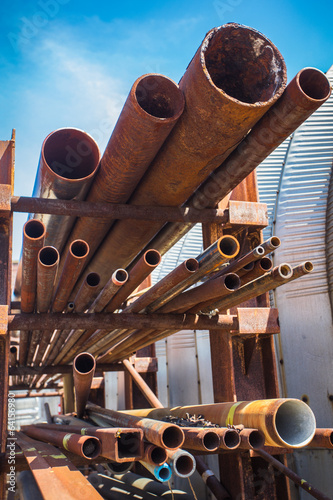 Industrial rusty pipes in outdoor rack