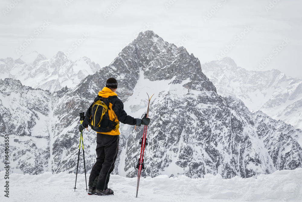 skier admiring the mountains