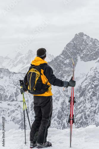 skier admiring the mountains