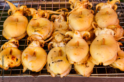 Grilled squid on the grill photo