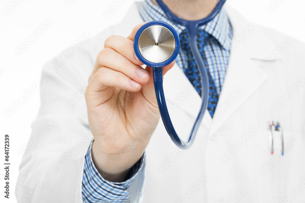 Medical doctor holding a stethoscope in his right hand Medical doctor holding a stethoscope in his right hand