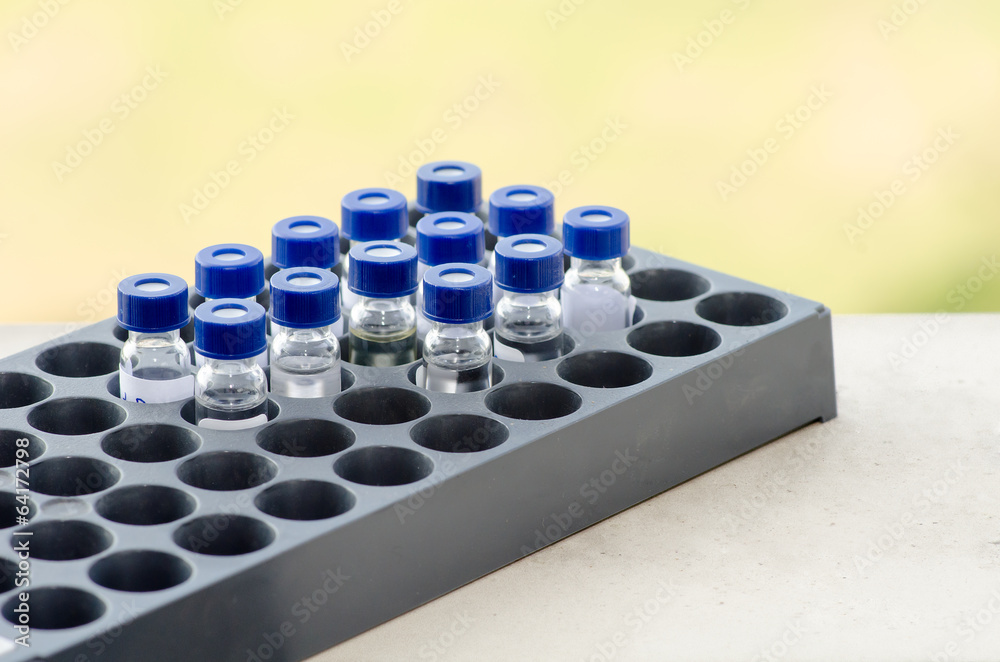 Sample vial in instrumental analysis tray Sample vial in instrumental analysis tray