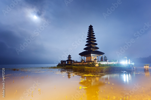 Ulun Danu temple at night with moon lighting, Bali, Indonesia