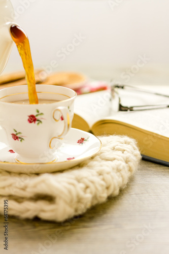 Wall Mural Tea being poured into china teacup vertical
