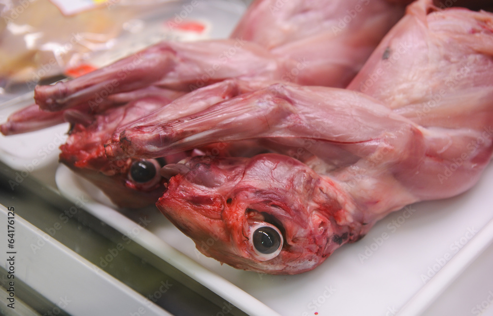 skinned rabbits in a butcher shop