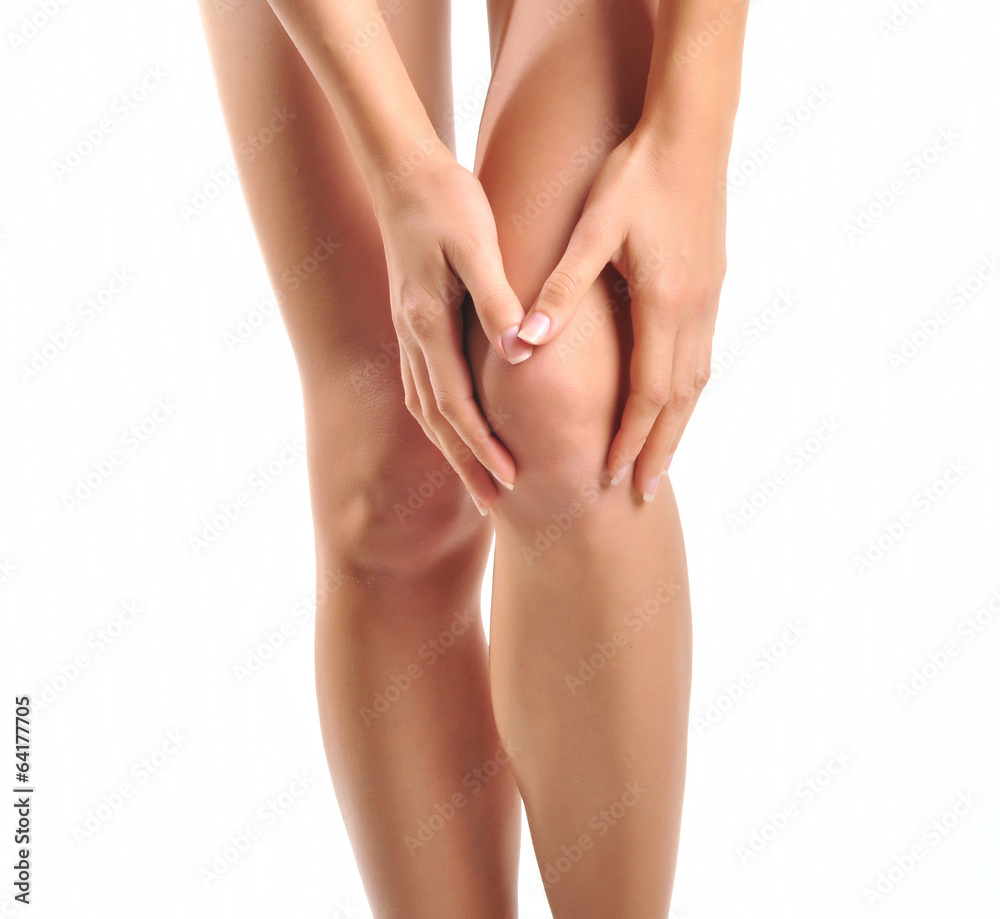 Woman having knee pain isolated on a white background