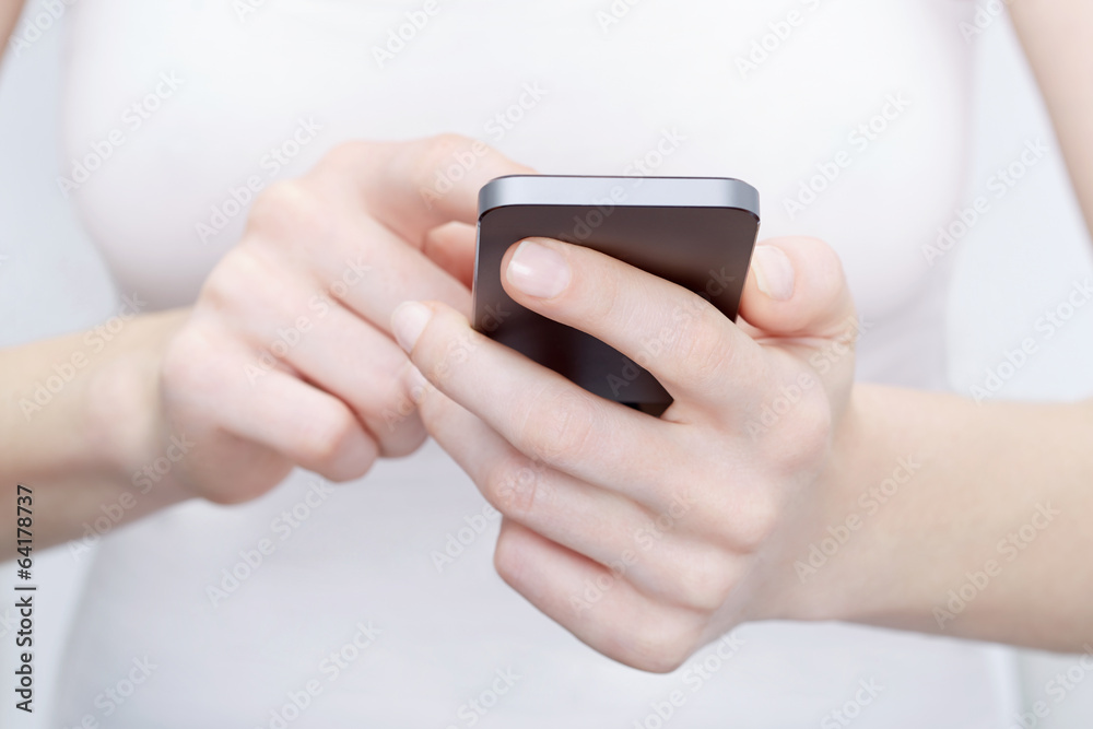 Close up of woman using a modern smartphone Close up of woman using a modern smartphone