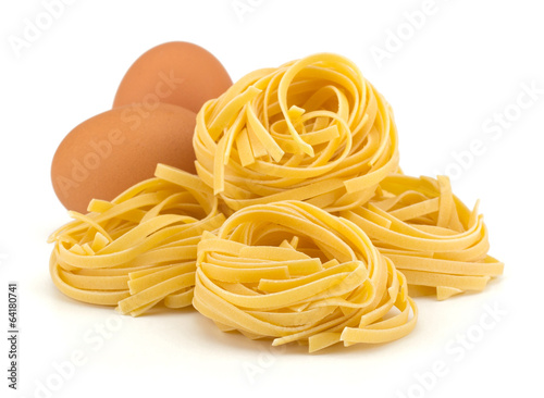 Italian egg pasta nest isolated on white background