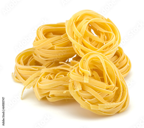 Italian egg pasta nest isolated on white background