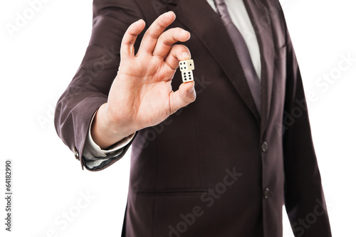 businessman throwing dices isolated on white