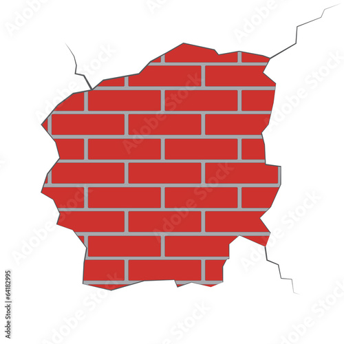 Brick wall with the damaged plaster