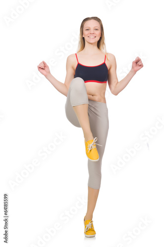 Young female doing exercises on white