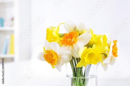 Fototapeta Naklejka Na Ścianę i Meble -  Beautiful spring flowers in vase on home interior background