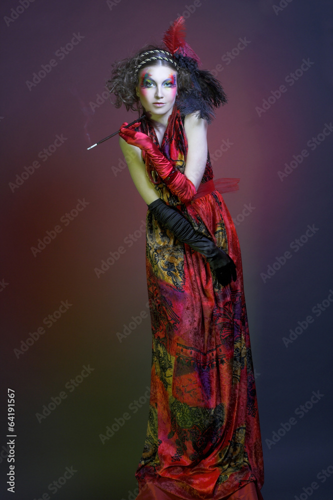 Stylish woman smoking cigarette. Stylish woman smoking cigarette.