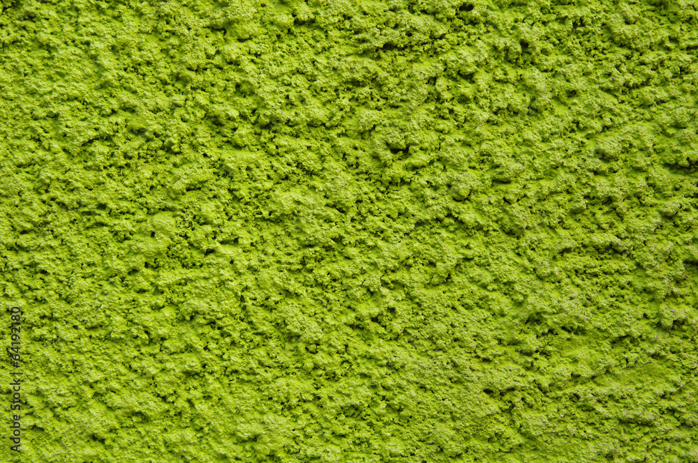Green rough plaster on wall Green rough plaster on wall