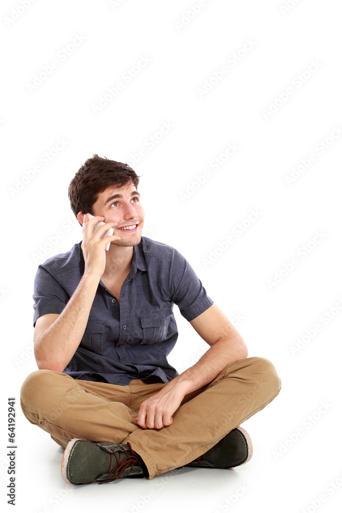 casual young man speaking on the phone casual young man speaking on the phone