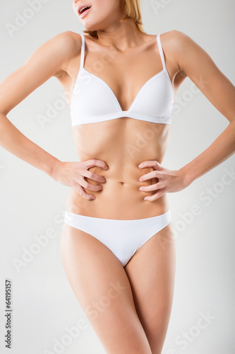 beautiful woman in white bikini, isolated on white background