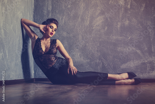 Studio fashion portrait of young sexy woman