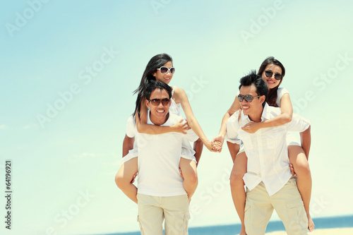 group of happy young people have fun on summer day