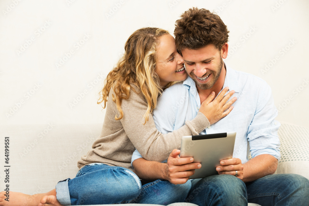 Young couple using tablet computer Young couple using tablet computer