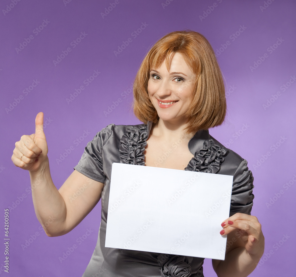 Naklejka premium Beautiful woman with a blank (paper) for your text