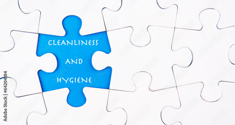 Fototapeta premium Missing puzzle revealing the CLEANLINESS AND HYGIENE words