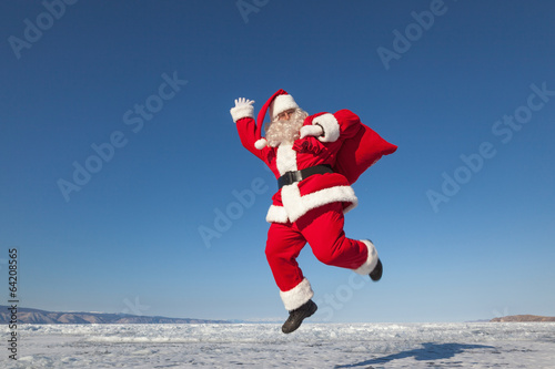 Jumping Santa Claus outdoors
