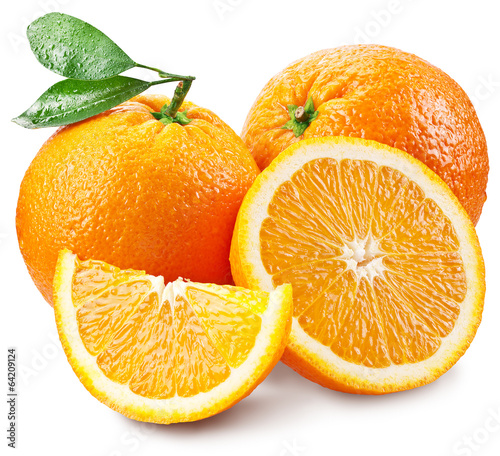 Oranges with slice and leaves isolated on a white background.
