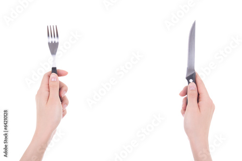 female hands with fork and knife isolated on white