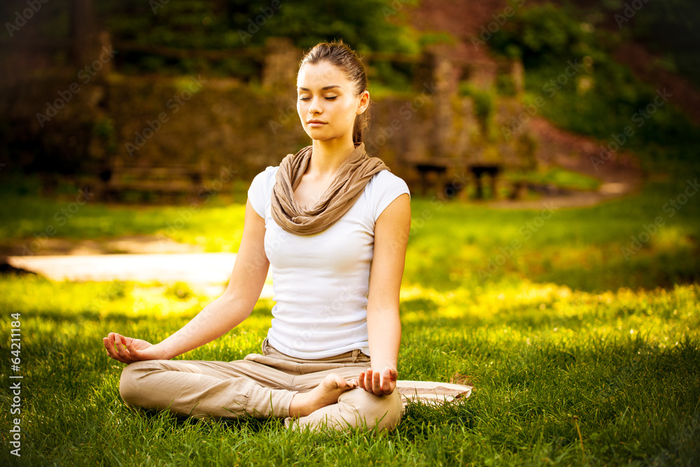 Young female meditate in nature Young female meditate in nature