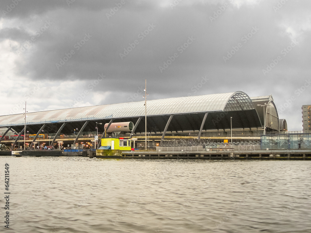 Embankment and the railway station in Amsterdam. Netherlands Embankment and the railway station in Amsterdam. Netherlands