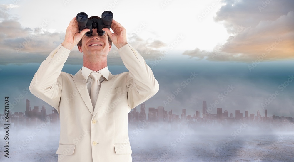 Composite image of confident businessman with binoculars Composite image of confident businessman with binoculars