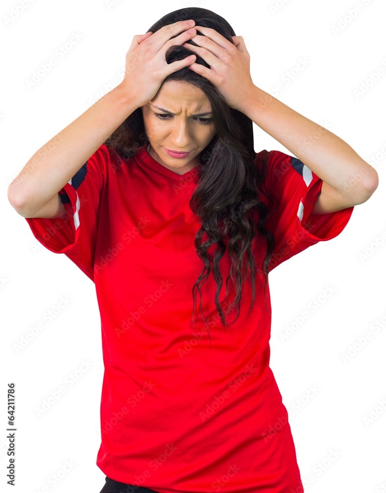 Disappointed football fan in red Disappointed football fan in red