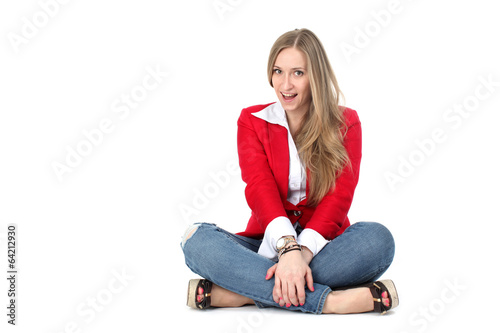Casual woman in red coat smiling isolated over a white backgroun