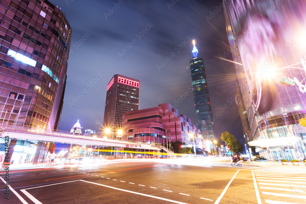 Fototapeta premium Car light trails and urban landscape in modern city